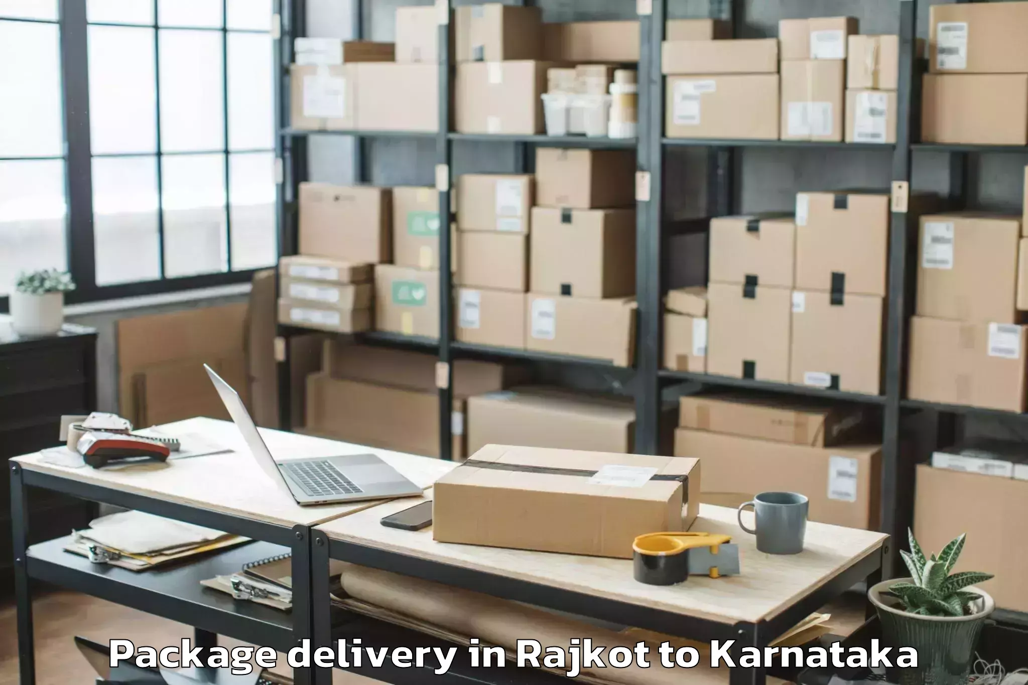 Trusted Rajkot to Harugeri Package Delivery